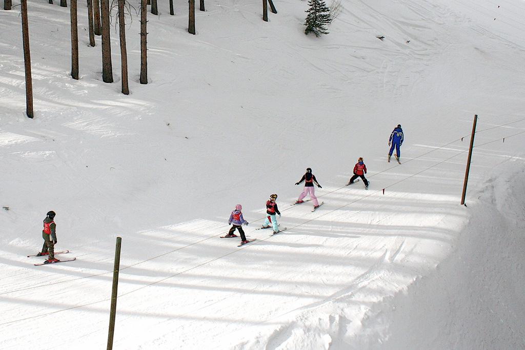 Children taking a ski lesson in Vail, Colorado. 